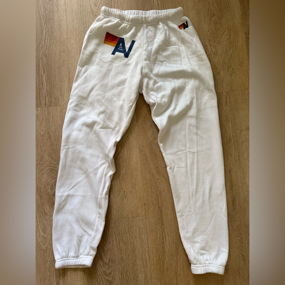 Aviator Nation White Track Joggers with Sunset Stripe & Navy 'A' Logo - Picture 2 of 8